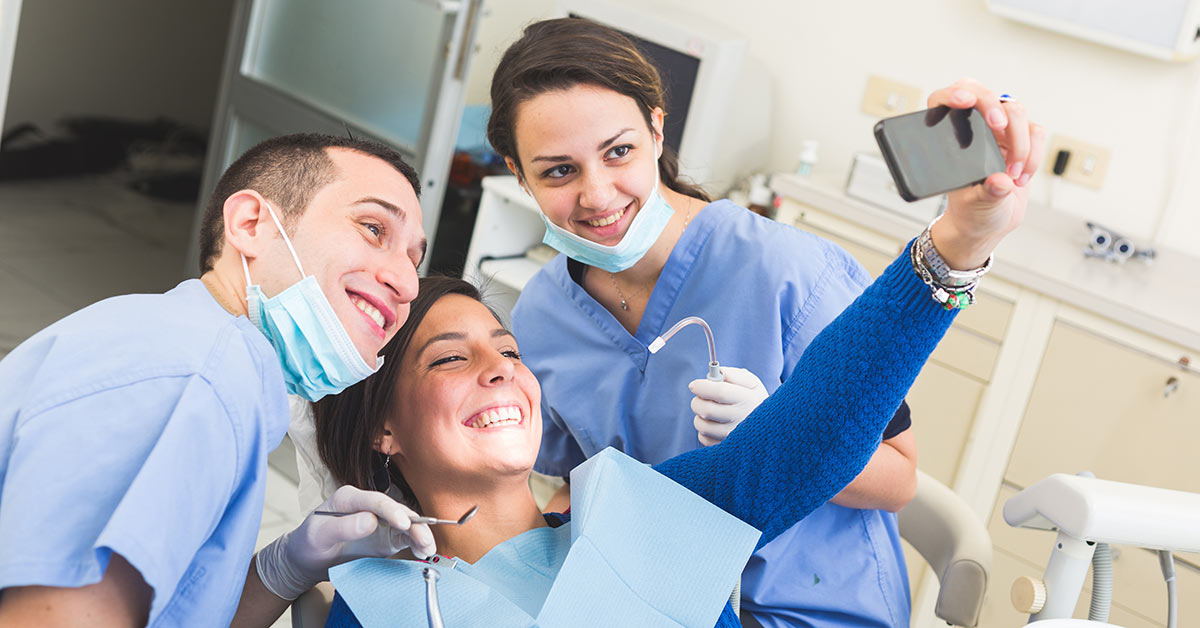 Dentist and customer having groupie